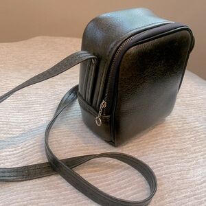Vintage Camera Bag in Dark Brown Vegan leather with faux fur inside.